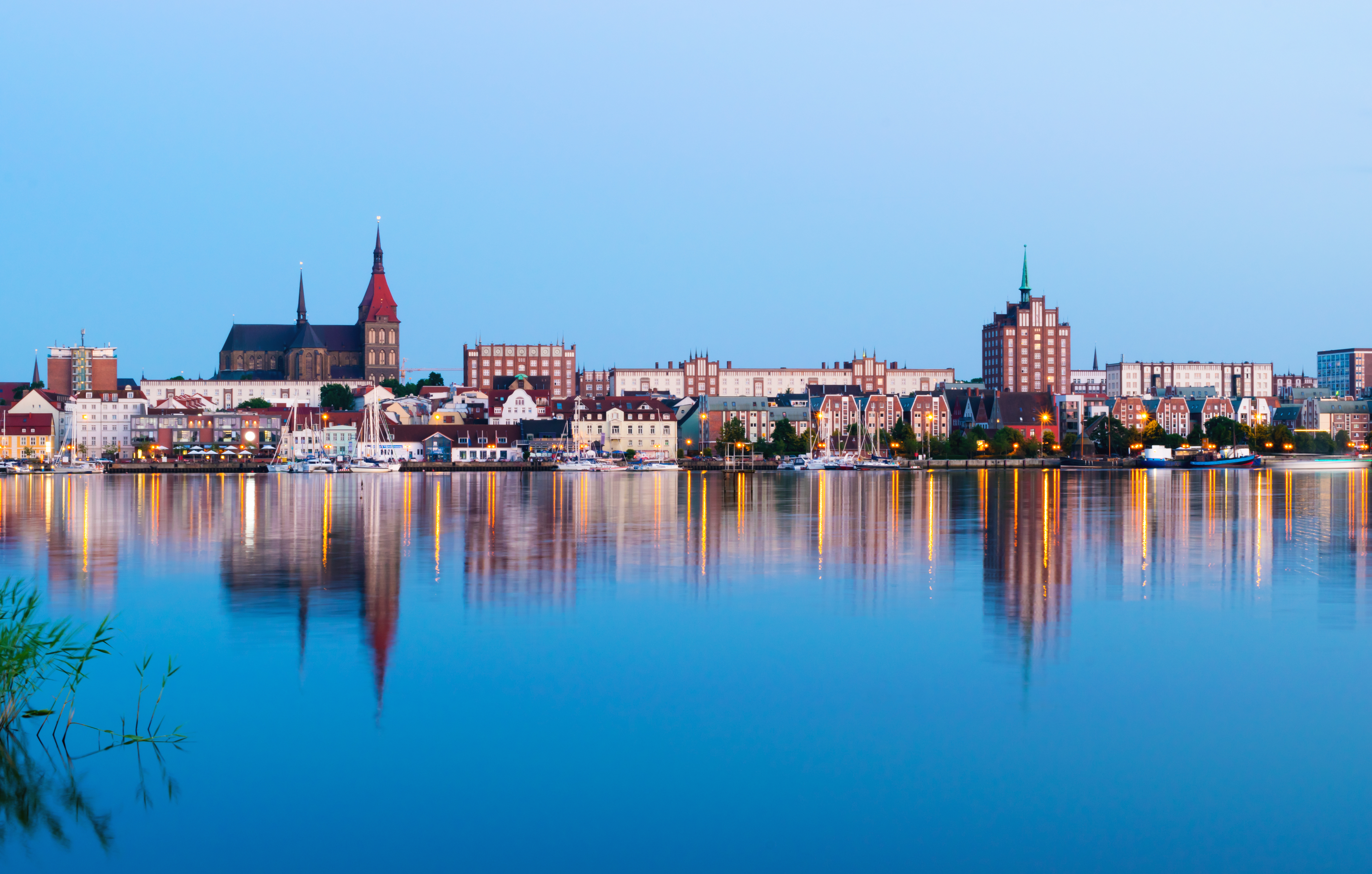 Night Panorama View to Rostock. River Warnow and City port. Mecklenburg-Vorpommern, Germany