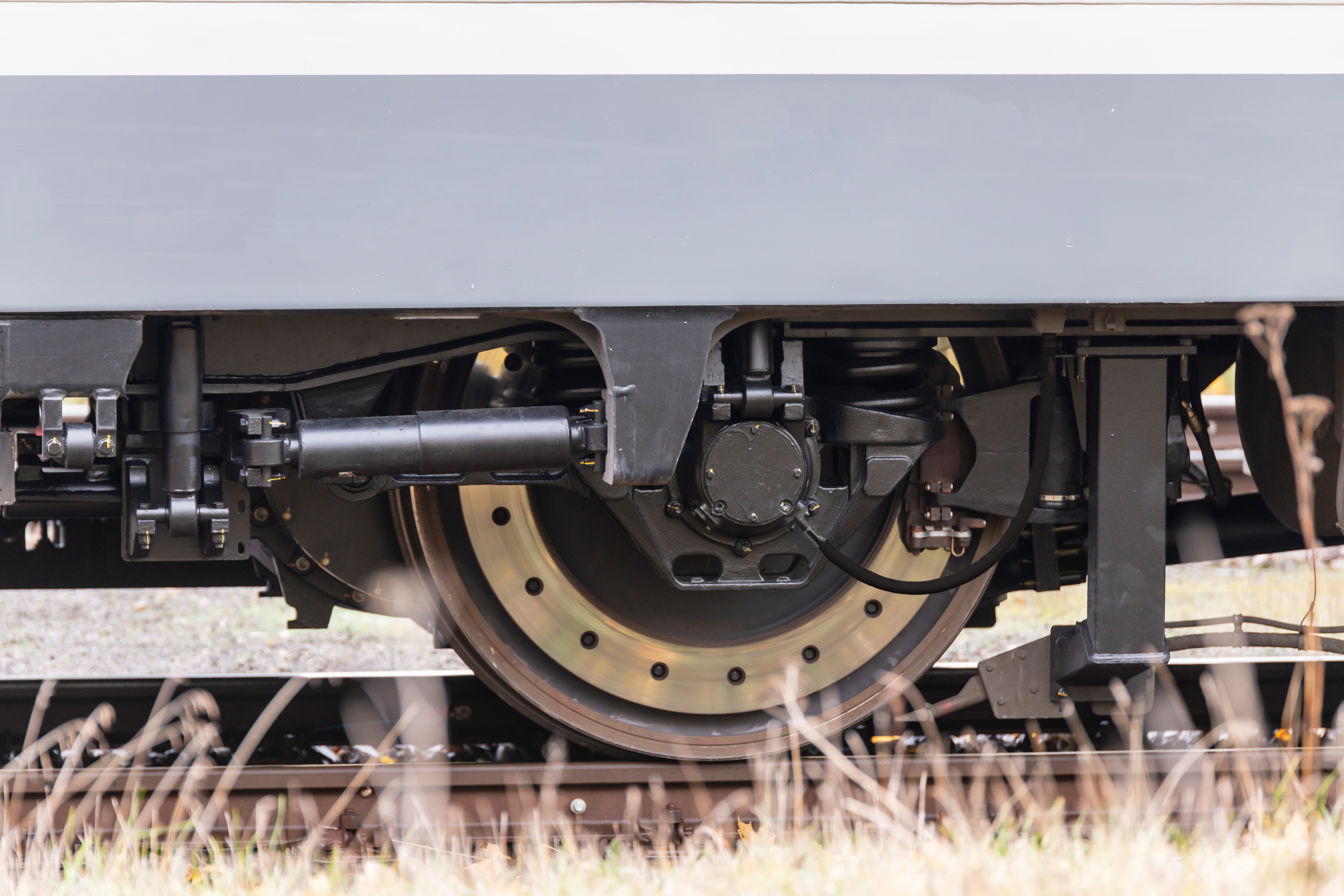 You can see the wheelset of a train from the side on which a speed sensor is installed