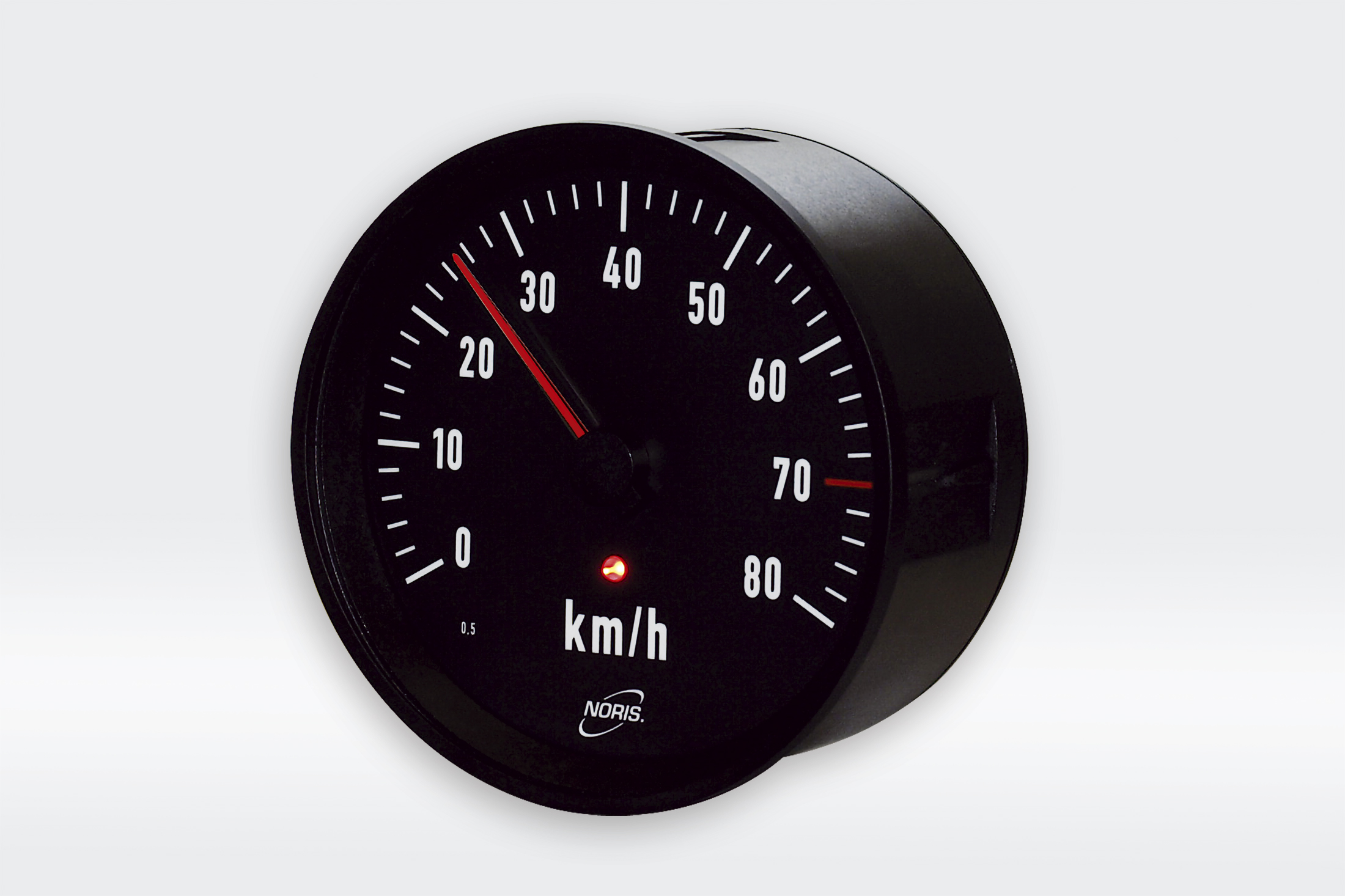 The image shows a round analogue indicator with integrated signalling led. The scale is black with white letters and a red pointer.
