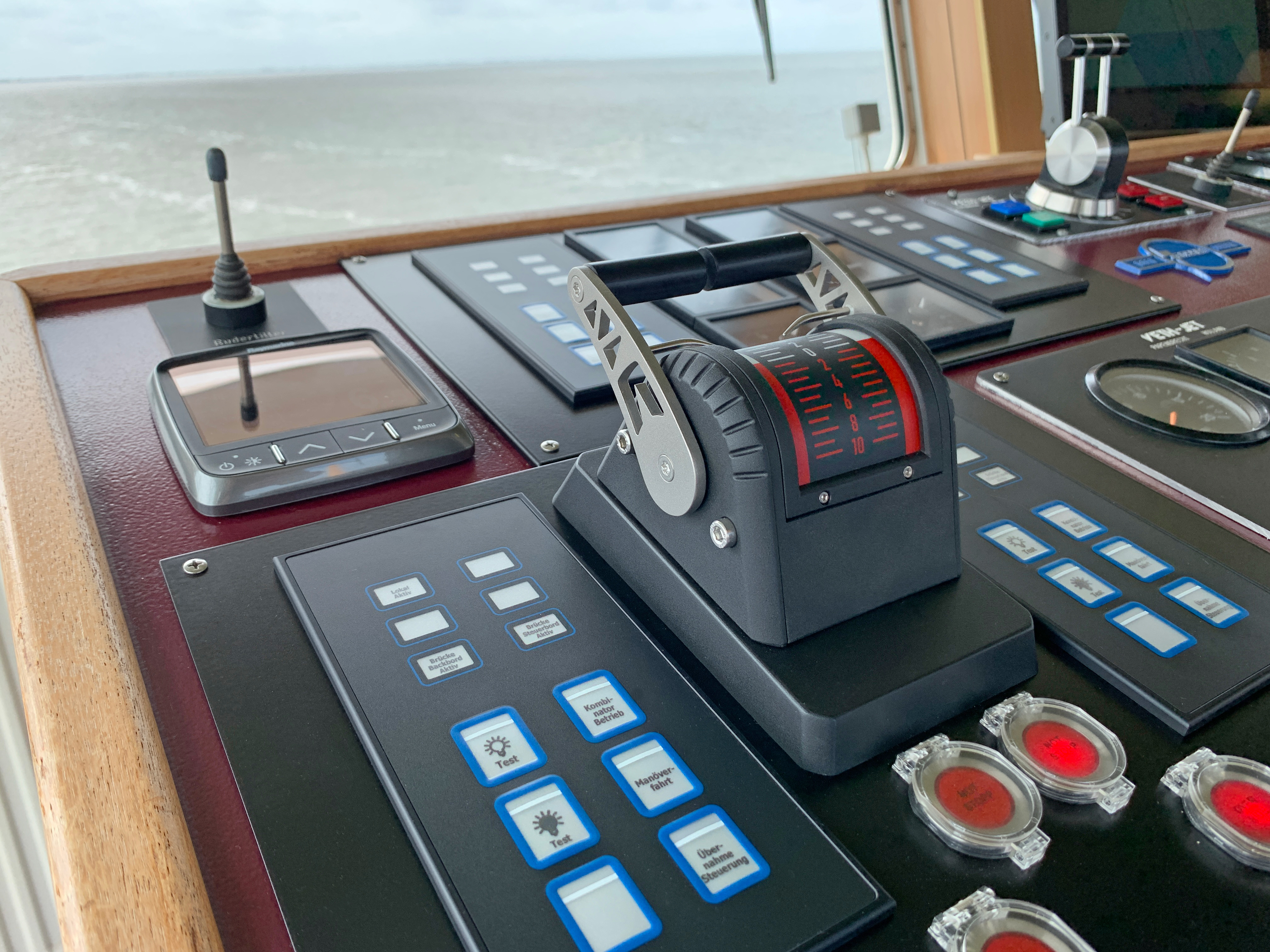 The image shows the Bridge panel of the Frisia 2 passenger ship with a Noris control lever panel