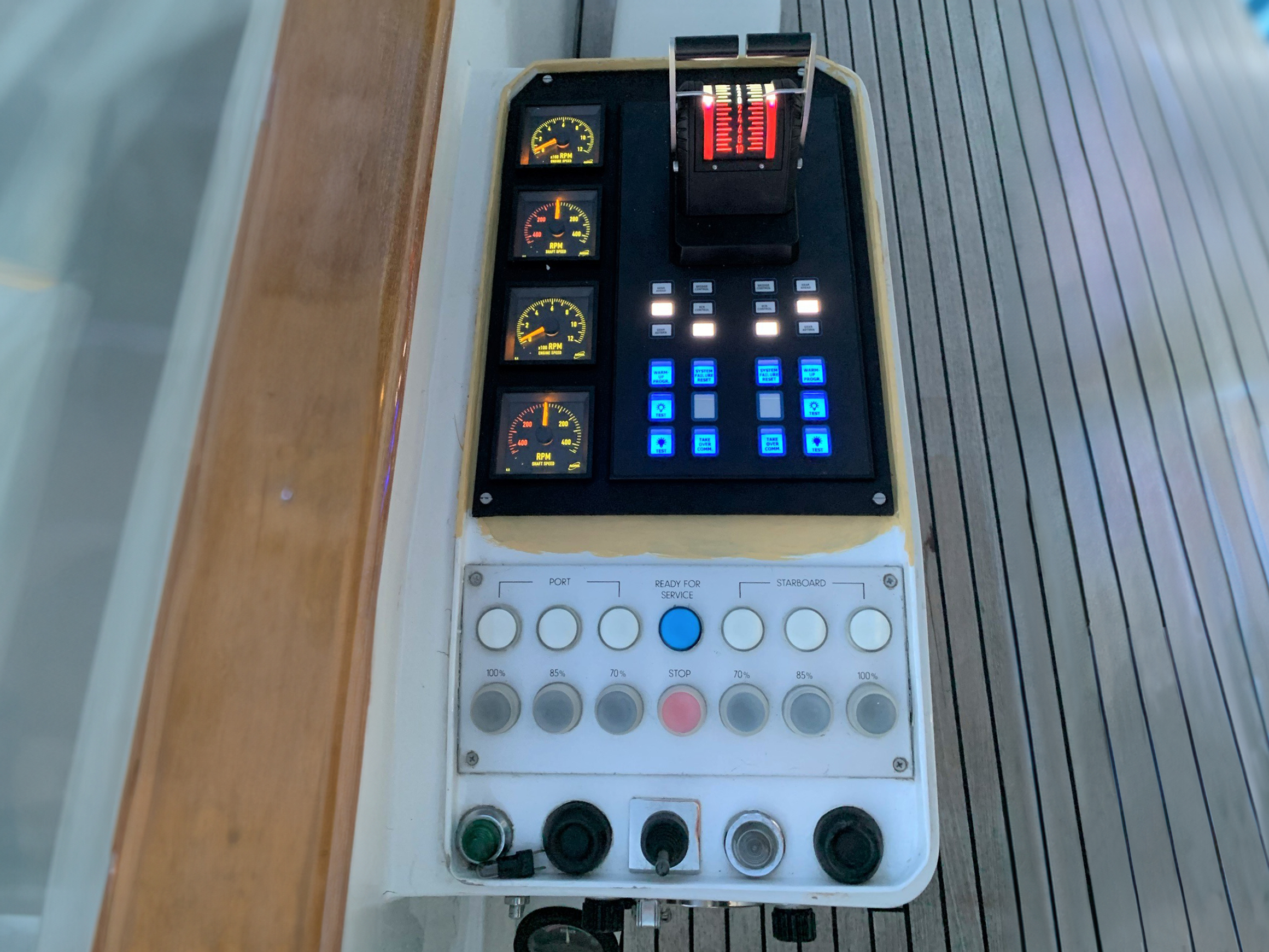 The image shows the refit solution of a megayacht propulsion control system - new outside control lever panel